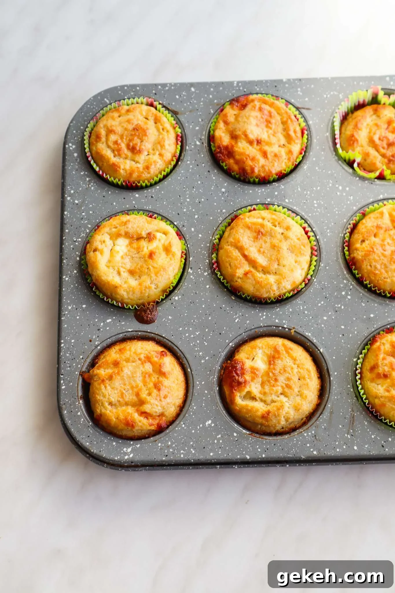 Flourless savoury oatmeal feta muffins! This easy savoury breakfast muffin recipe is simple, gluten free and so delicious! If you're looking for some new easy meal prep breakfast ideas, you've got to try these feta muffins!
