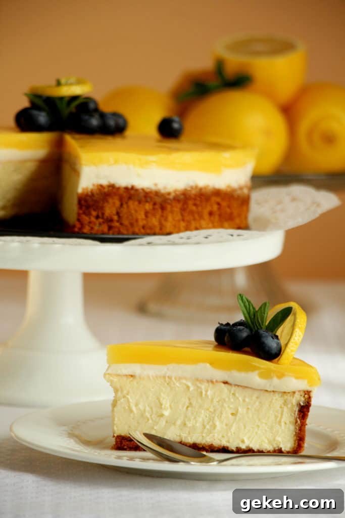 Creamy Lemon Cheesecake Recipe: Zesty Slice of Perfection 3 best lemon cheesecake slice on plate