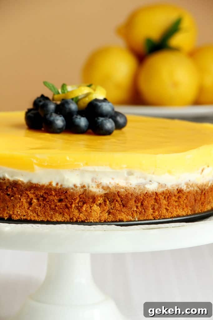 Creamy Lemon Cheesecake Recipe: Zesty Slice of Perfection 6 close up of lemon cheesecake