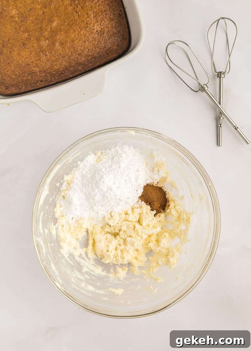 Moist Pumpkin Sheet Cake Recipe with Cream Cheese Frosting 17 Powdered sugar and cinnamon added to the whisked butter, cream cheese and vanilla with.