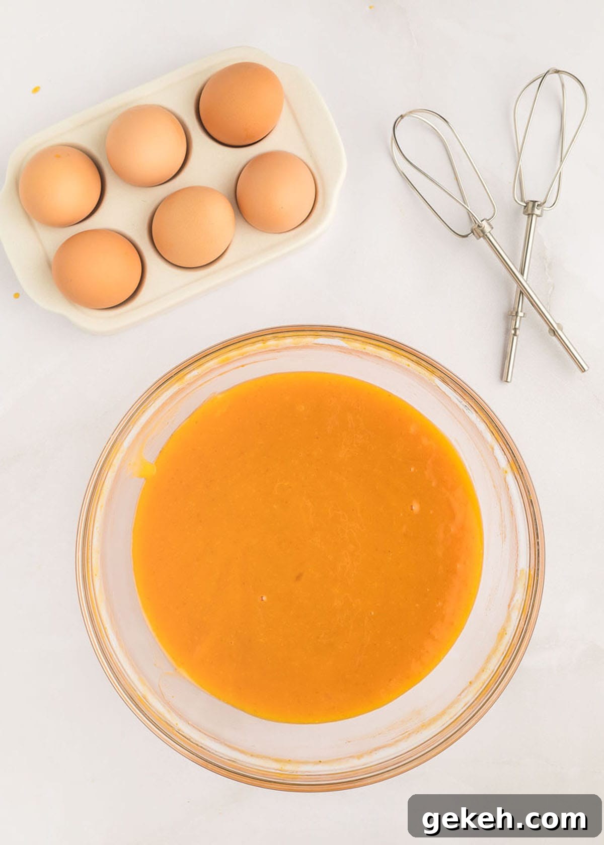 Moist Pumpkin Sheet Cake Recipe with Cream Cheese Frosting 9 Eggs and canned pumpkin mixed together.