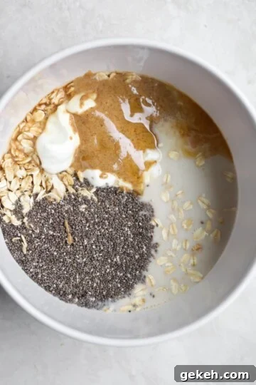 oats, milk, chia seeds, almond butter in bowl