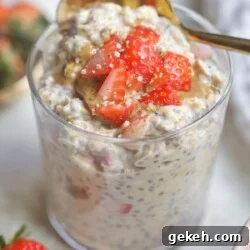 cup with oatmeal and strawberries