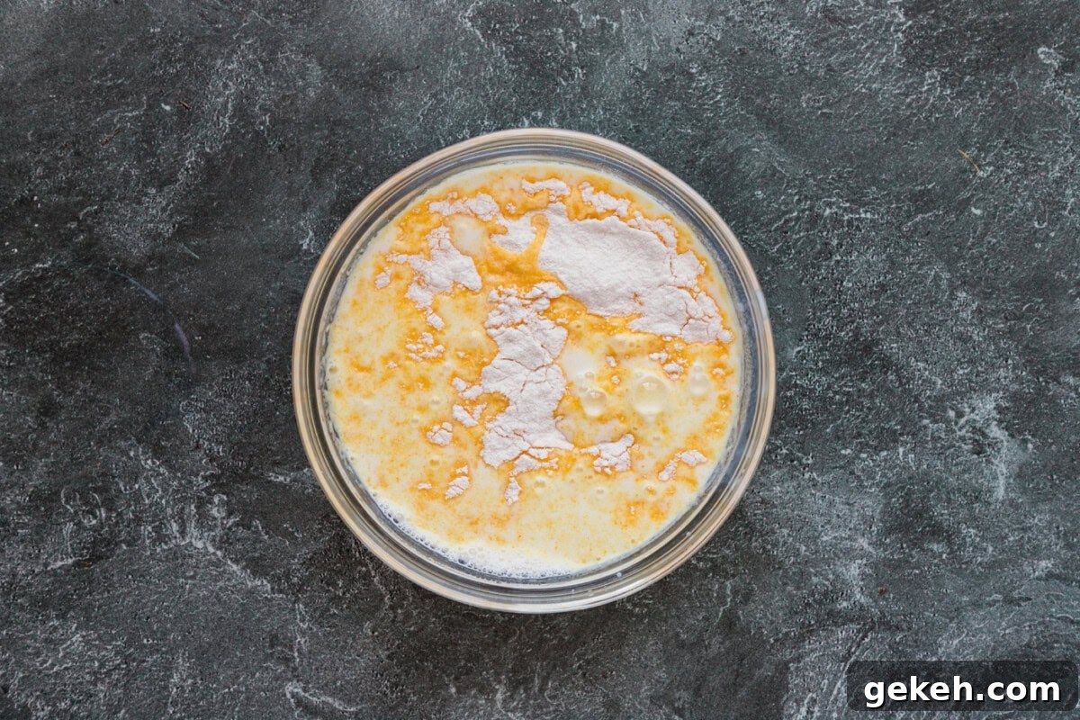 instant pudding mix in a bowl with. milk