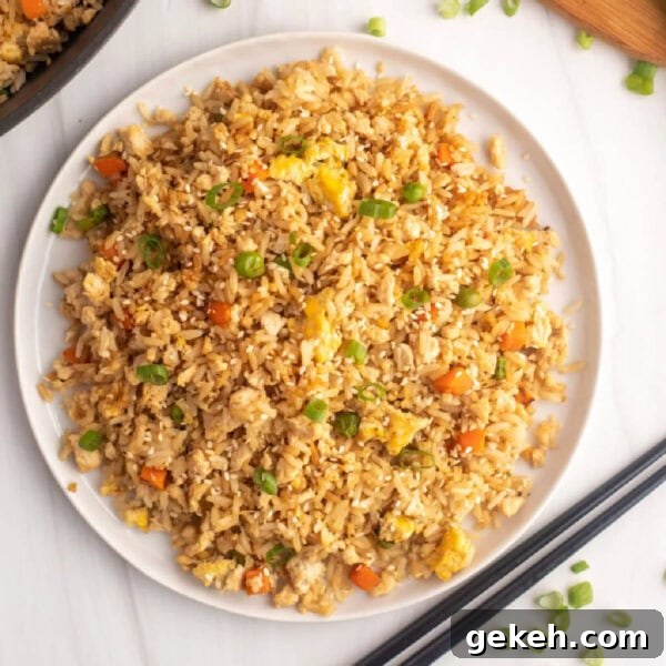 Authentic Pad Thai on a Blackstone Griddle: Simple Recipe 17 Chinese fried rice with chopsticks.