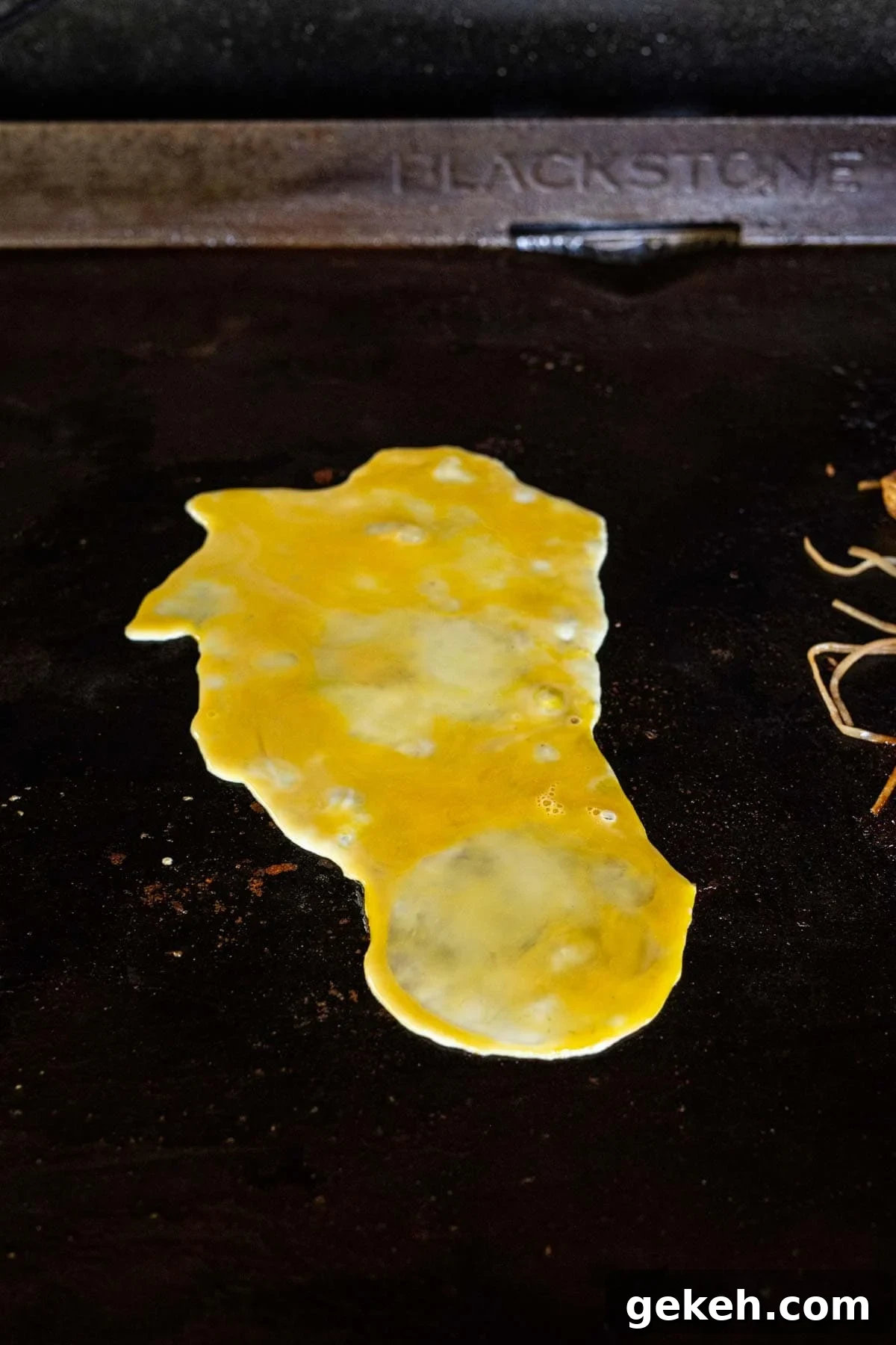 Authentic Pad Thai on a Blackstone Griddle: Simple Recipe 10 Scrambled eggs poured onto the Blackstone Griddle