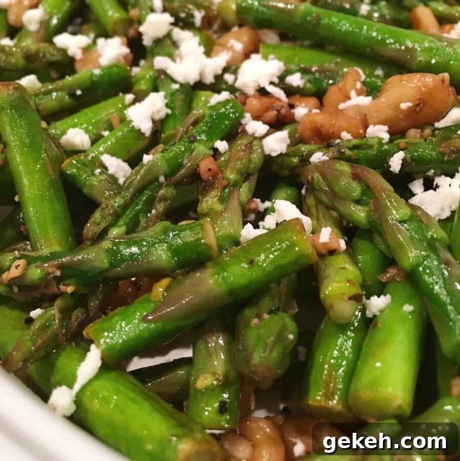 Roasted Asparagus with Toasted Walnuts and Feta 2 Chopped asparagus sautéed in walnut oil, topped with toasted walnuts and feta cheese