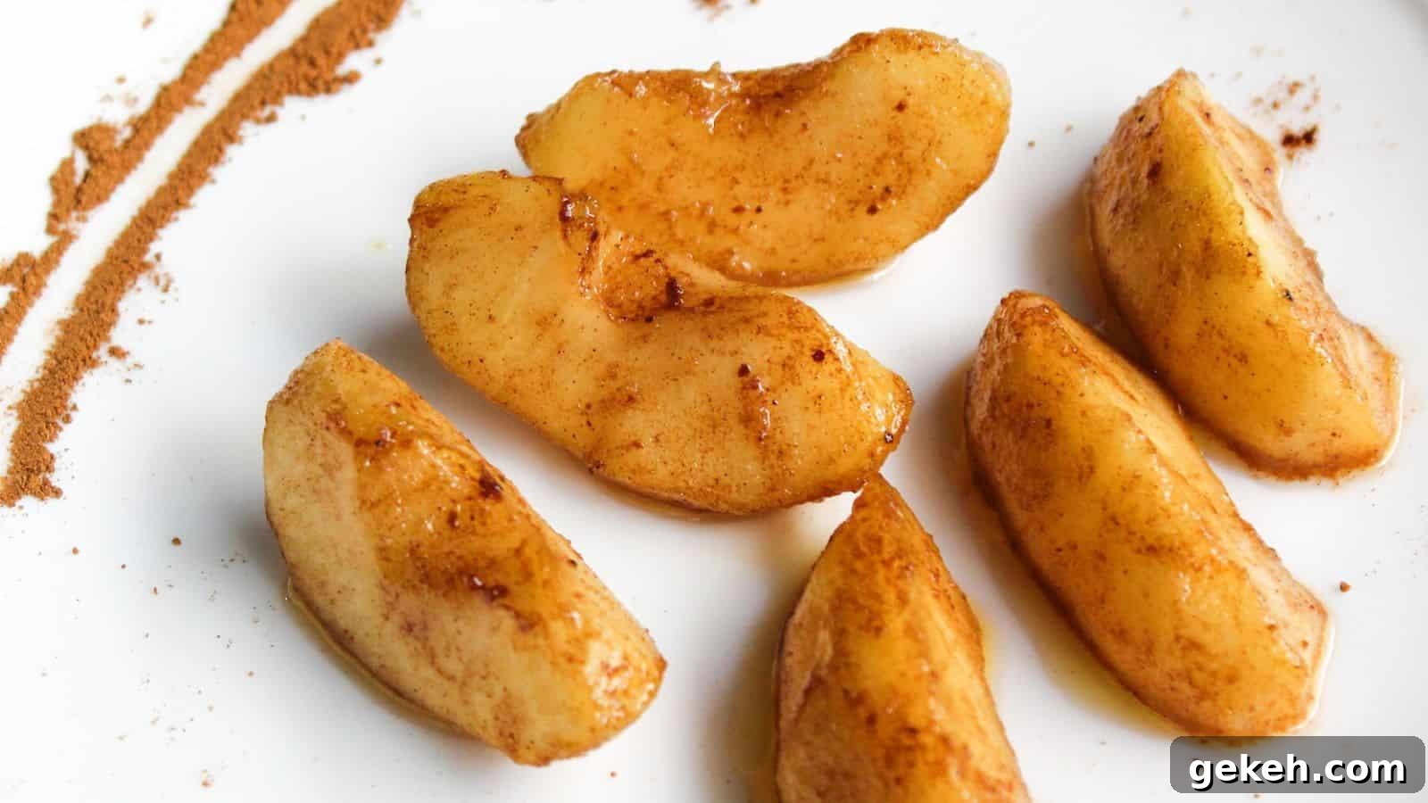 19 Desserts for Two to Share Straight from the Pan 17 Cinnamon apple slices on a white plate.