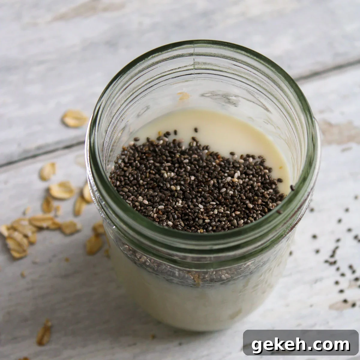 Creamy Peanut Butter Overnight Oats Recipe for Quick Breakfast 4 Chia seeds and oat milk in a mason jar.