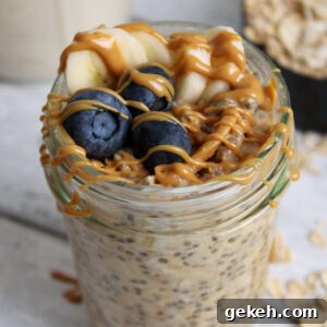 Creamy Peanut Butter Overnight Oats Recipe for Quick Breakfast 9 Peanut Butter Overnight Oats in a mason jar topped with blueberries and bananas.