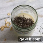 Creamy Peanut Butter Overnight Oats Recipe for Quick Breakfast 10 Chia seeds and oat milk in a mason jar.