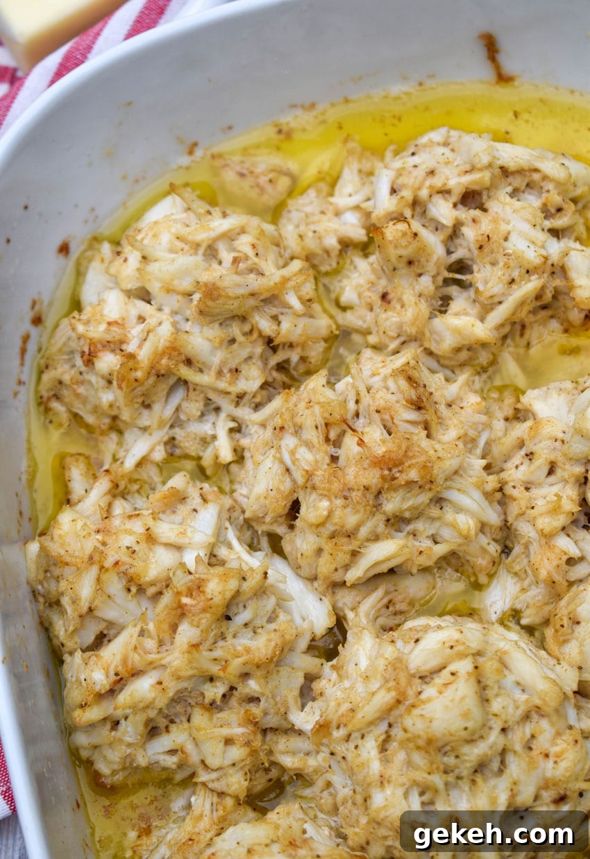 Jerry’s Place Baked Lump Crab Cakes Recipe (Copycat) 3 baked lump crab cakes in butter in a white casserole dish