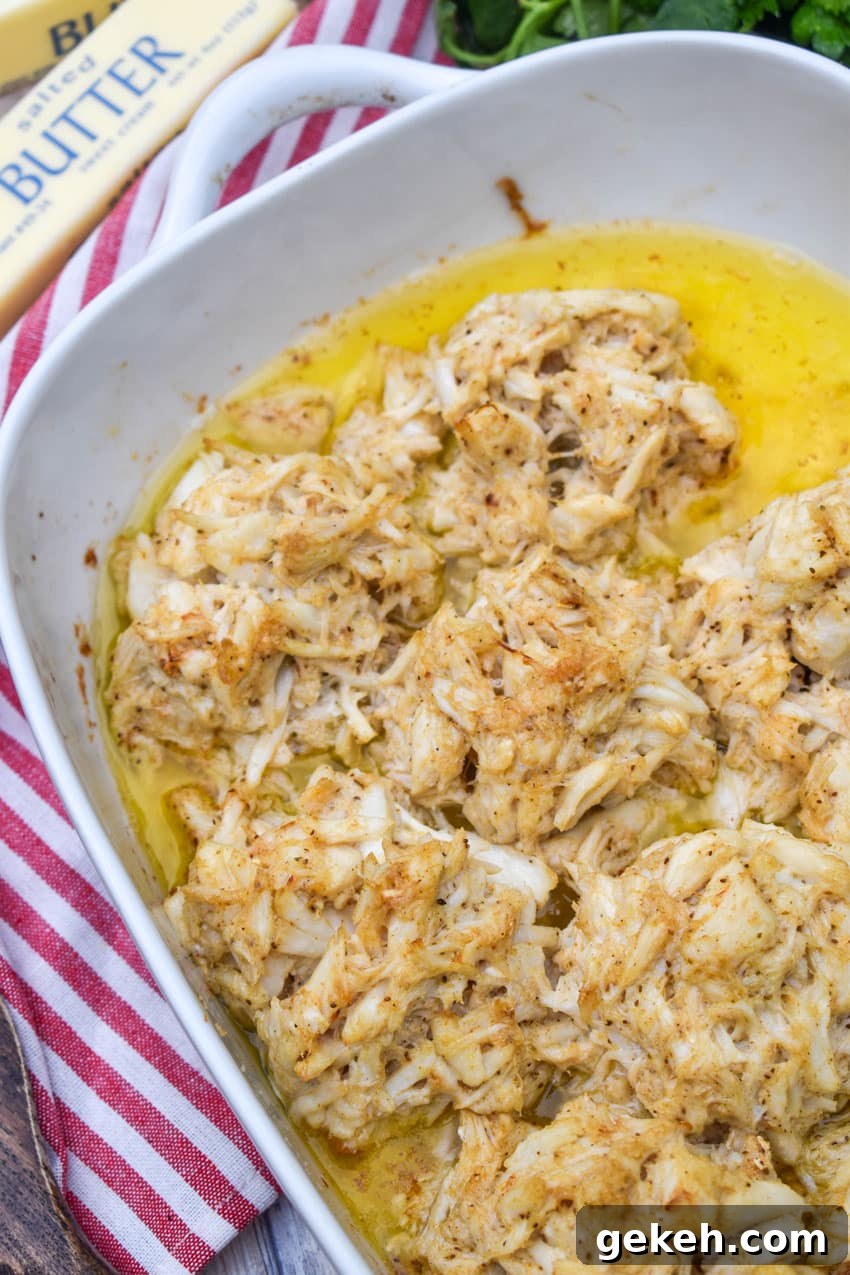 Jerry’s Place Baked Lump Crab Cakes Recipe (Copycat) 4 baked lump crab cakes in butter in a white casserole dish