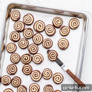 Chocolate Pinwheel Cookies: Swirl Cookie Recipe for Parties 11 A sheet pan of freshly baked pinwheel cookies.