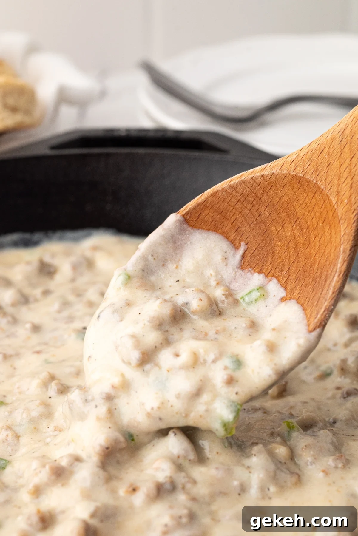 Jalapeño Sausage Gravy Recipe for Spicy Southern Biscuits 2 jalapeno sausage gravy in a cast iron skillet