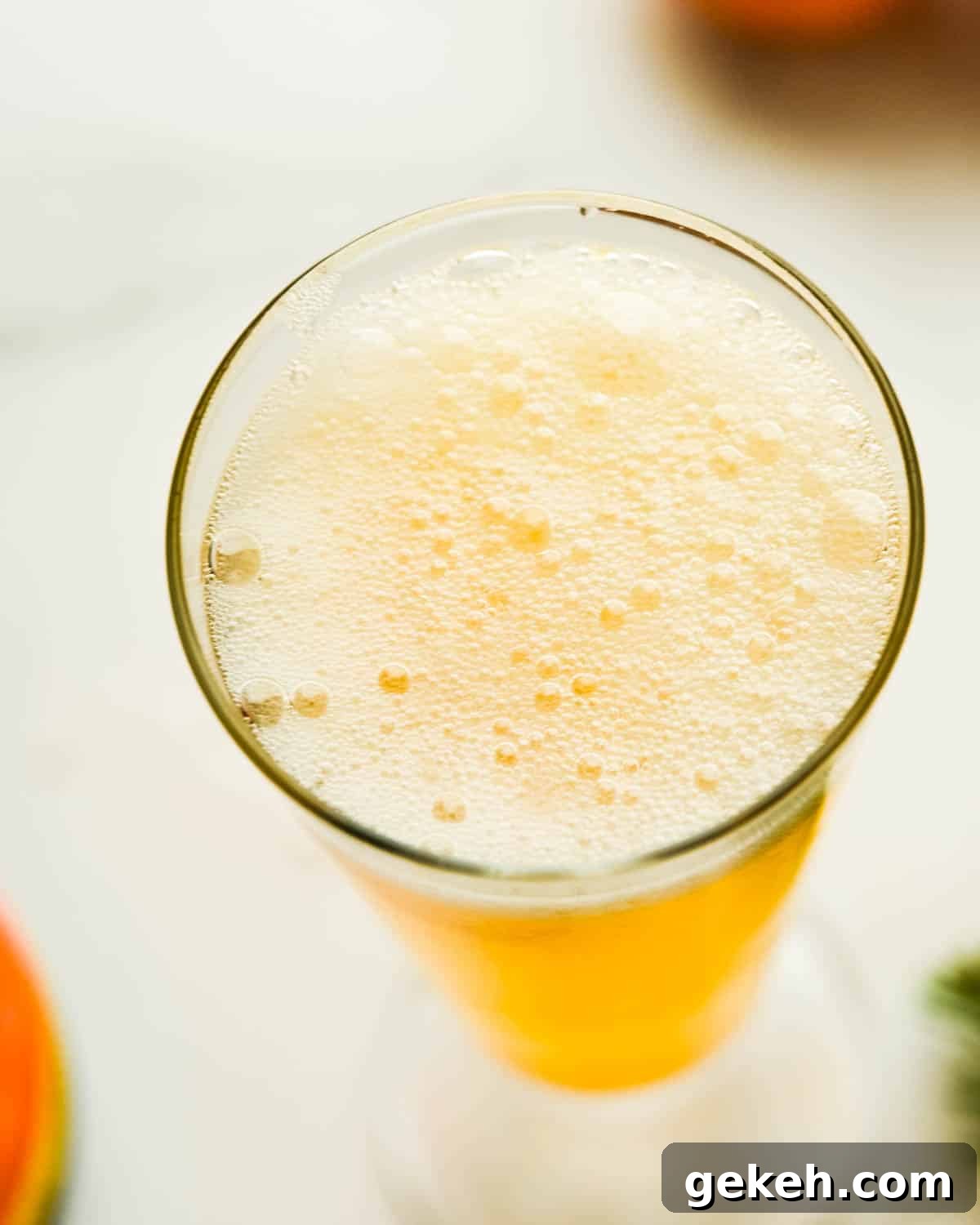 Bubbles on the top of the tangerine guava drink.