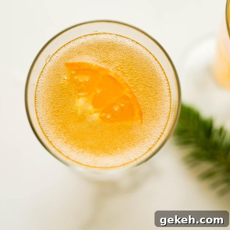 Fizzy guava cocktail in a flute glass.
