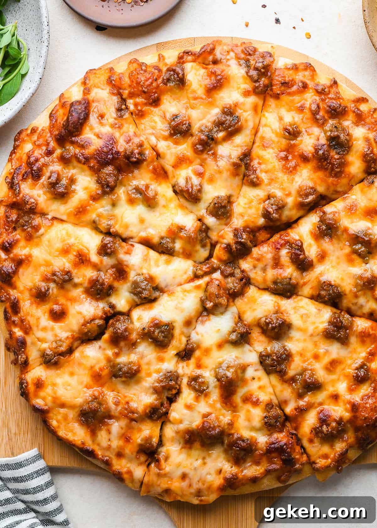 Classic Sausage Pizza Recipe: Crispy Crust & Savory Toppings 15 a Sausage Pizza cut into 8 triangular slices