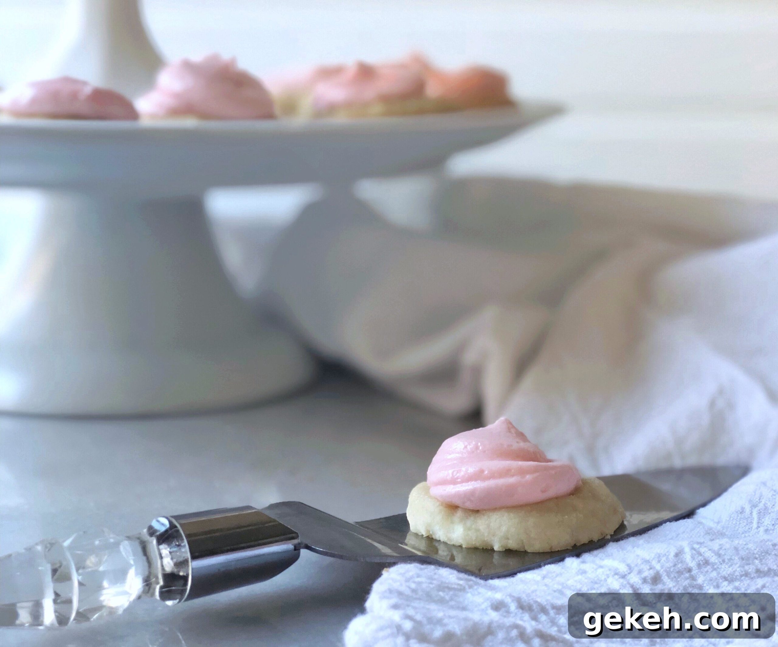 Pressed Almond Sugar Cookies — Crisp, Buttery Almond Slices 2 single almond sugar cookie on server