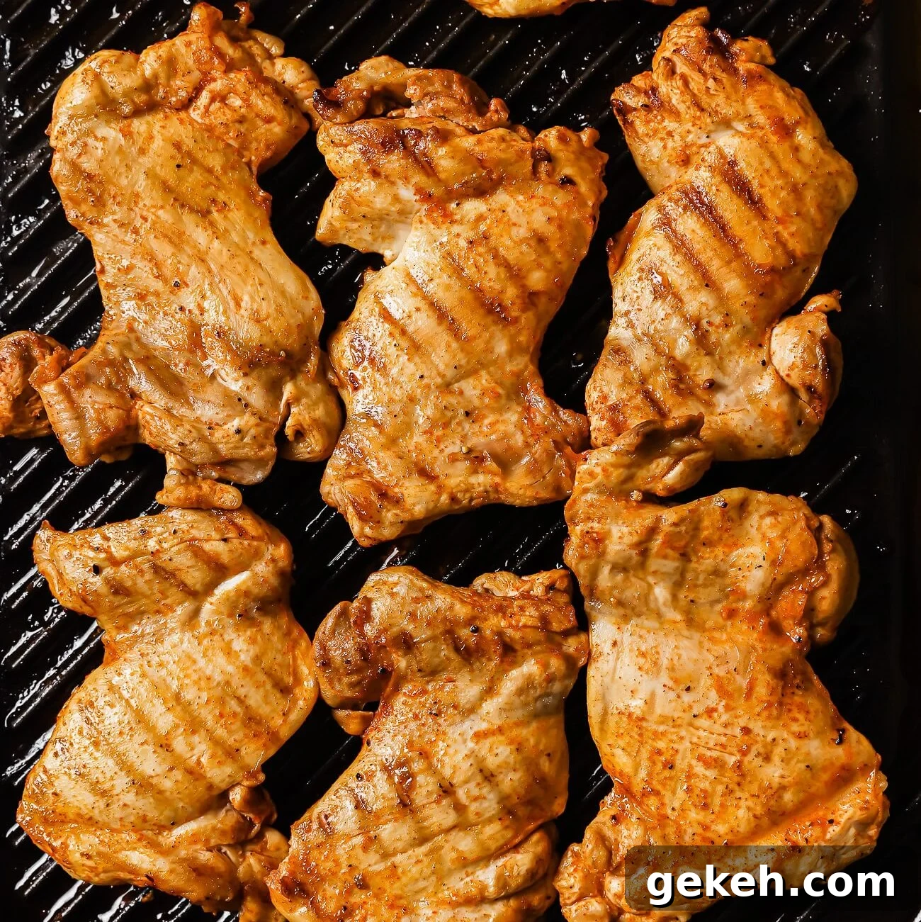Chicken Tacos with Savory Homemade Marinade 6 Chicken thighs cooking on a grill pan.