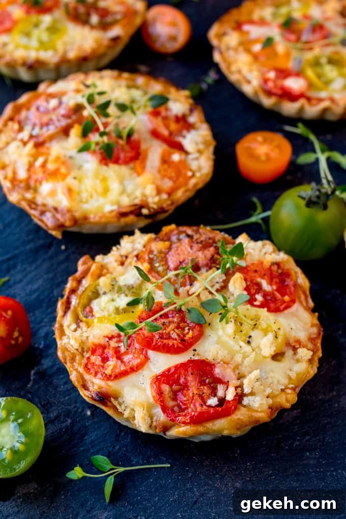 Savory Cheese and Tomato Tarts — Crispy Rustic Tart Recipe 4 Cheese and Tomato Tarts with a rich tomato ragu and creamy béchamel sauce encased in shortcrust pastry. The best vegetarian lunch!