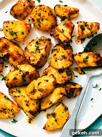 Air Fryer Parsnips with honey and mustard on a serving plate