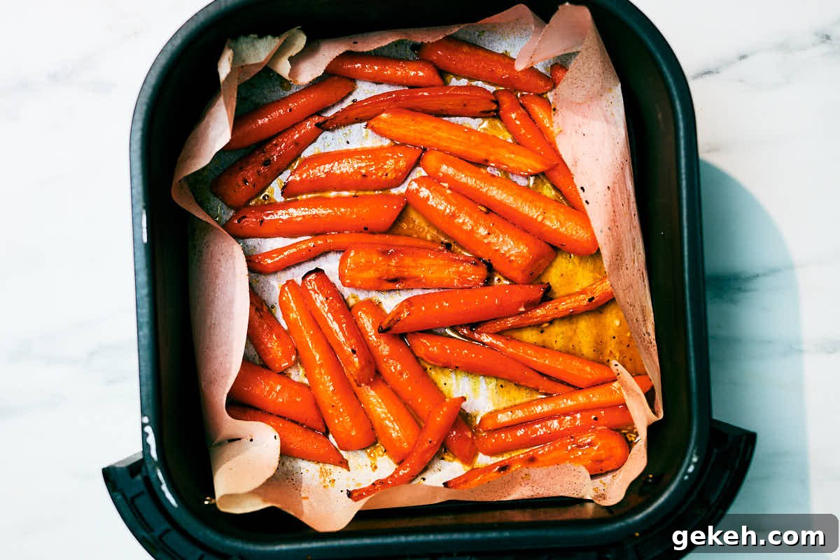 Honey Roasted Carrots in an air fryer basket after baking.