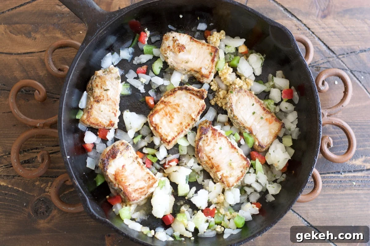 Garlic-Herb Pork Medallions with Tuscan White Beans Recipe 5 Make these easy one pan Garlic Herb Pork Medallions with Tuscan White Beans for a hearty comforting dish ready in under 30 minutes!