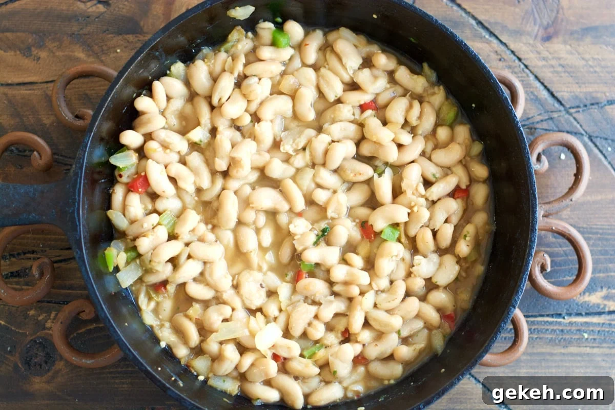 Garlic-Herb Pork Medallions with Tuscan White Beans Recipe 6 Make these easy one pan Garlic Herb Pork Medallions with Tuscan White Beans for a hearty comforting dish ready in under 30 minutes!