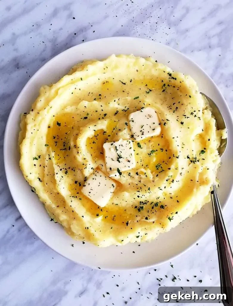 7 Classic Thanksgiving Sides to Make This Year 2 creamy-mashed-potatoes-overhead
