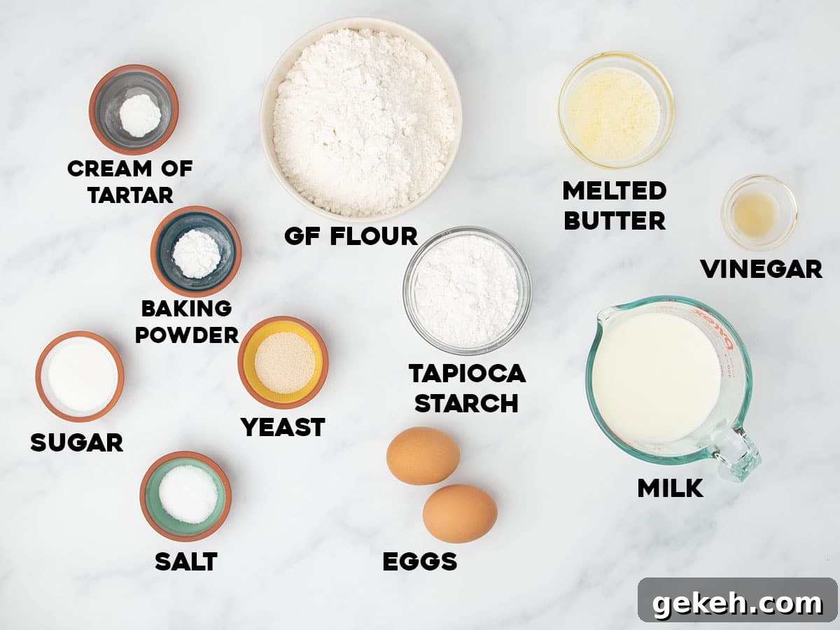 ingredients for gluten free bread machine recipe in small bowls with black block letters spelling name of each ingredient