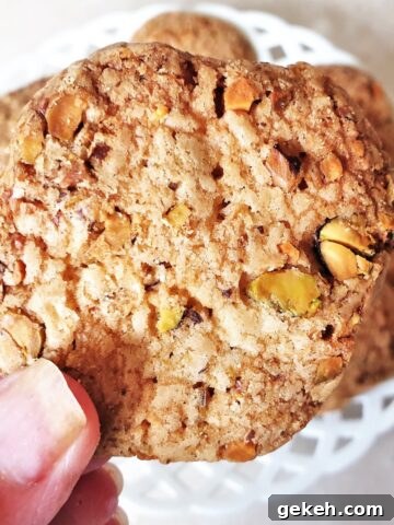Close up of a pistachio butter biscuit.