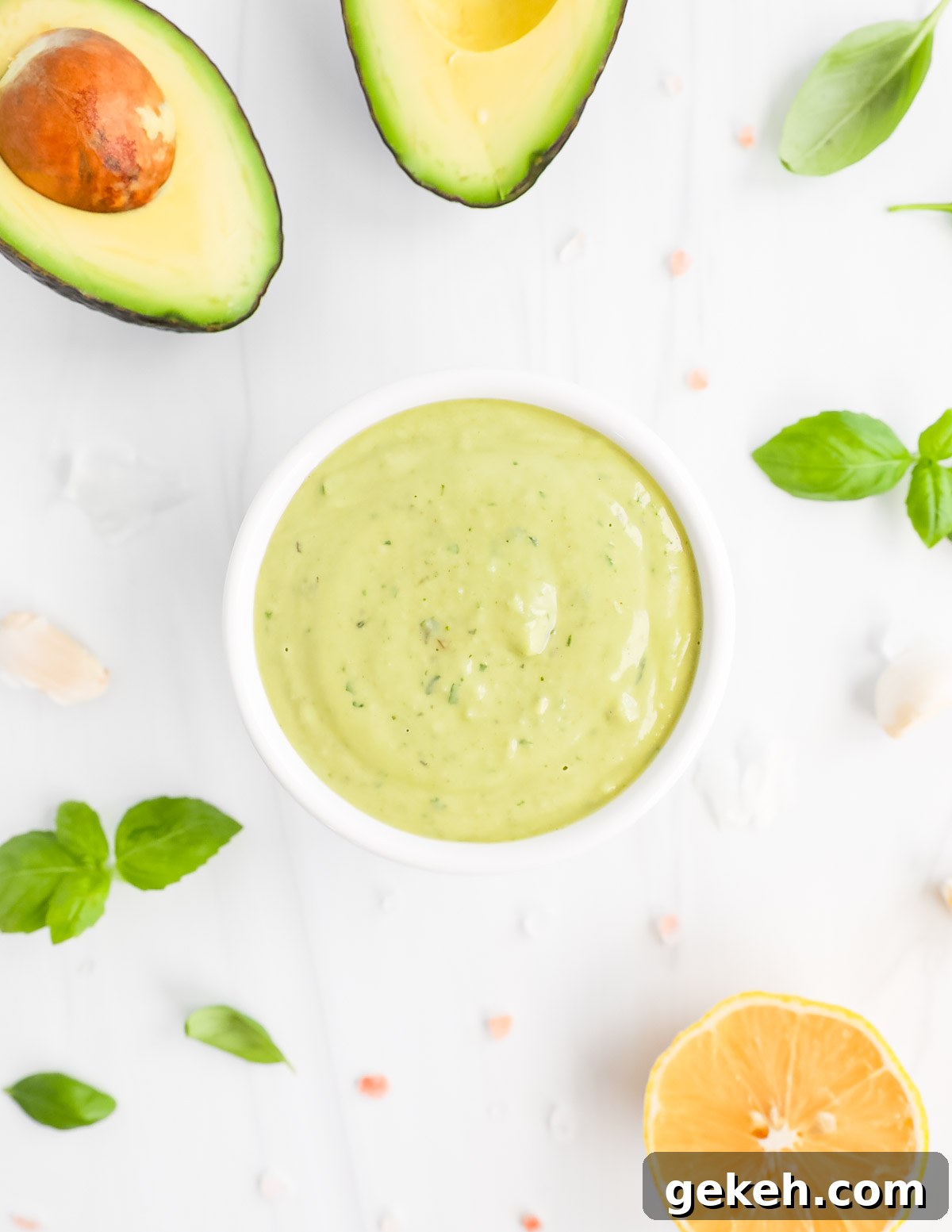 A creamy green sauce in a small white bowl.