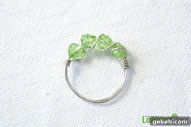 27 DIY Rings You'll Actually Want to Wear Every Day 15 Multi-Bead Wire Wrapped Ring