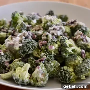 Broccoli and Cranberry Salad with Creamy Greek Yogurt Dressing 8 Broccoli Cranberry Salad in a white bowl.