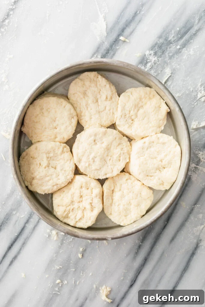old fashioned buttermilk biscuits cut out and placed in baking pan