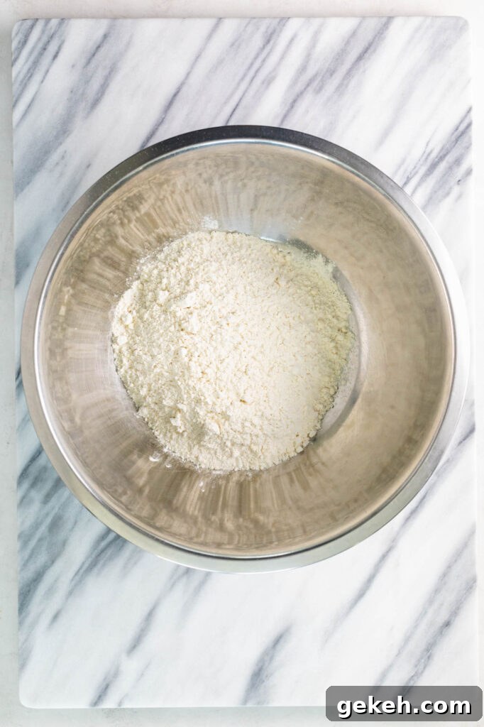 flour, baking powder, and salt in a large mixing bowl