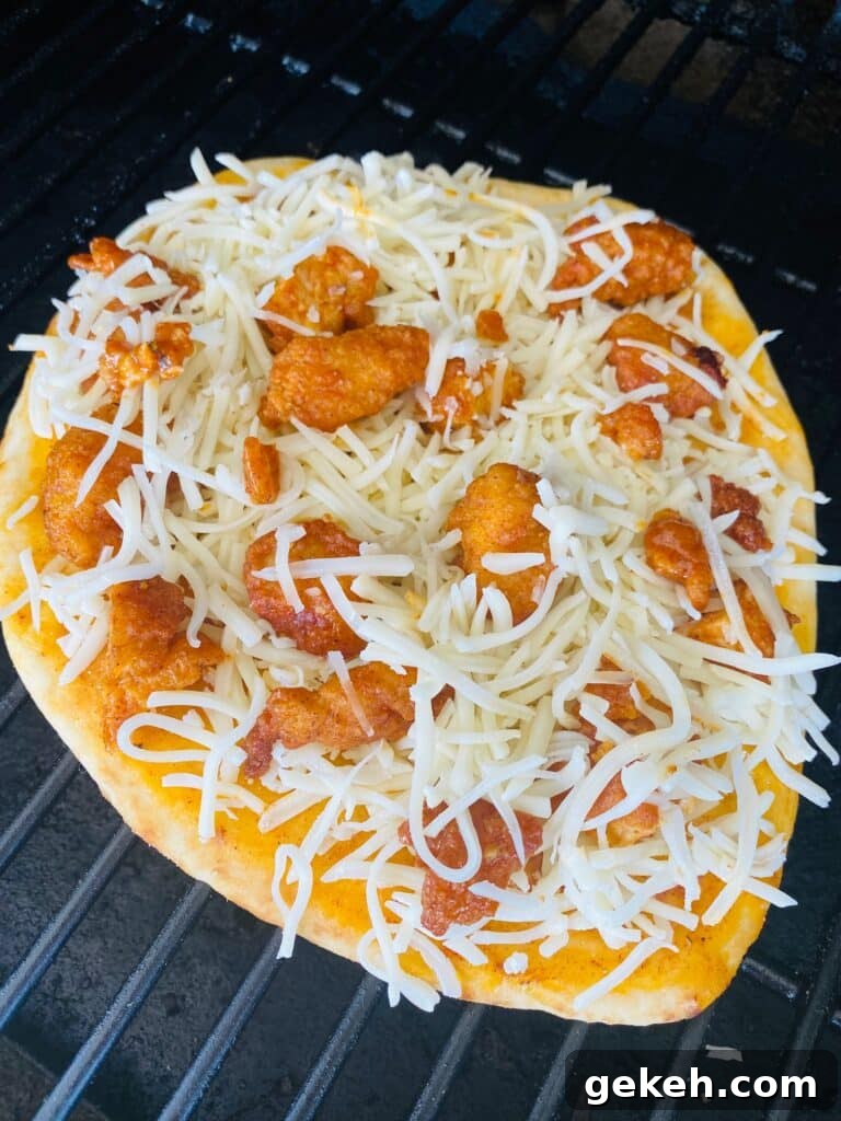 Nashville Hot Chicken Flatbreads on the Traeger Grill 7 Traeger Nashville Hot Chicken Flatbreads on the pellet grow before before cooking