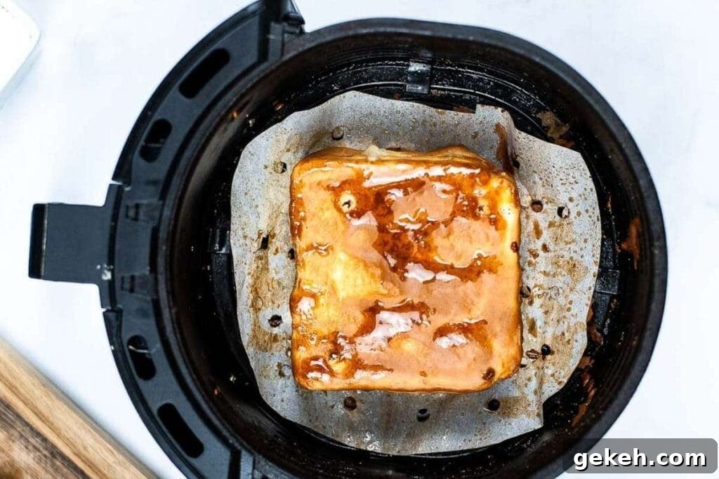 Crispy Air Fryer Monte Cristo Sandwich Recipe 6 top shot of monte cristo sandwich in the air fryer after cooking
