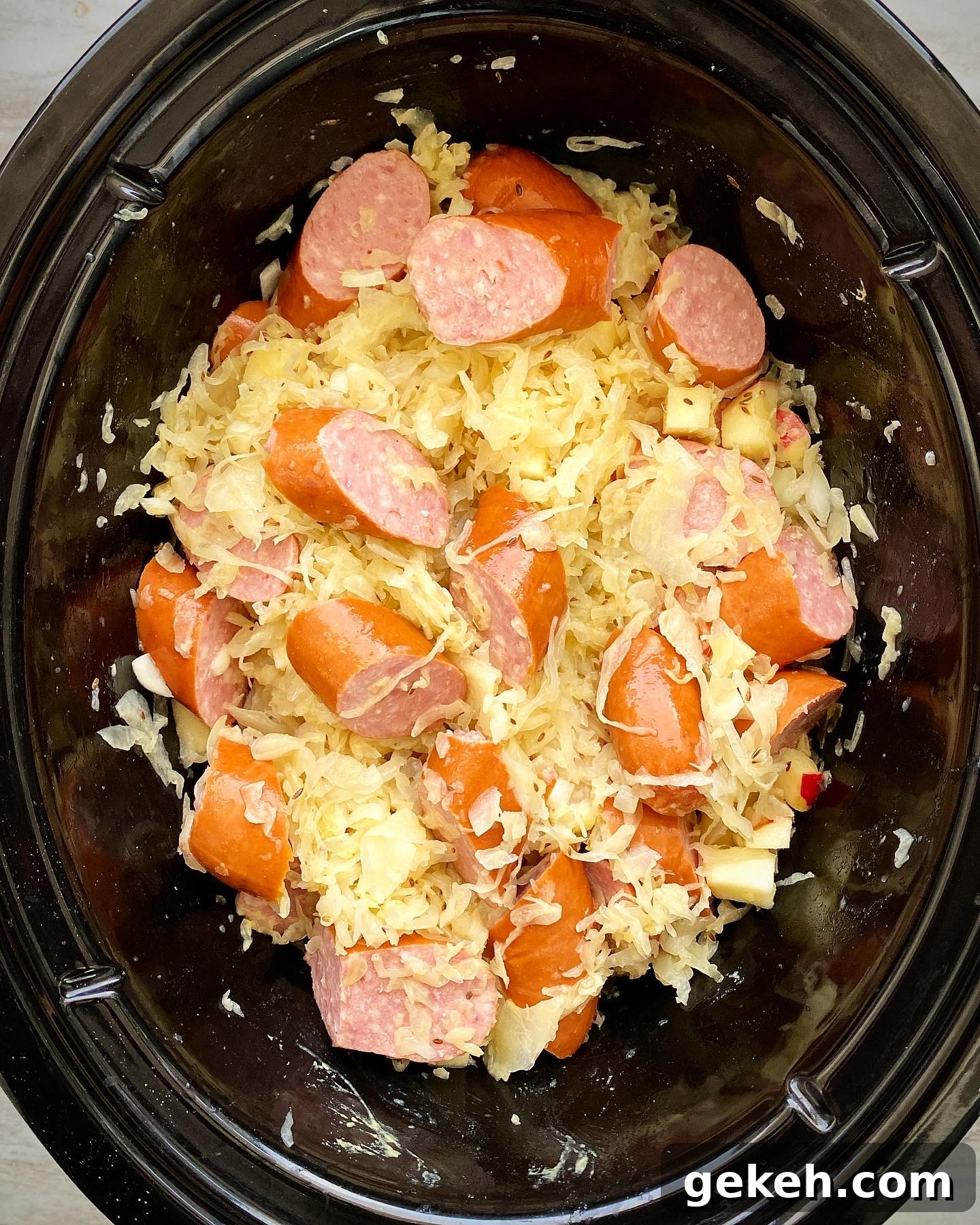 Slow Cooker Sausage with Sauerkraut: Simple Comfort Meal 4 uncooked Slow Cooker Sausage & Sauerkraut in the slow cooker
