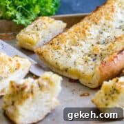 Cheesy Garlic Bread Recipe: Crispy, Gooey, and Irresistible 4 The Best Cheesy Garlic Bread! You might shirk at one of the ingredients, but believe me, you're going to want to try this one! Buttery, tangy, garlicky, and so, so cheesy. THE BEST!