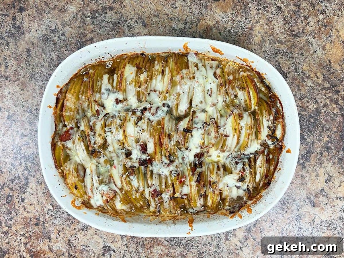 Creamy Scalloped Potatoes with Crispy Bacon 23 Scalloped potatoes right out of the oven with melted pepper jack cheese on top.