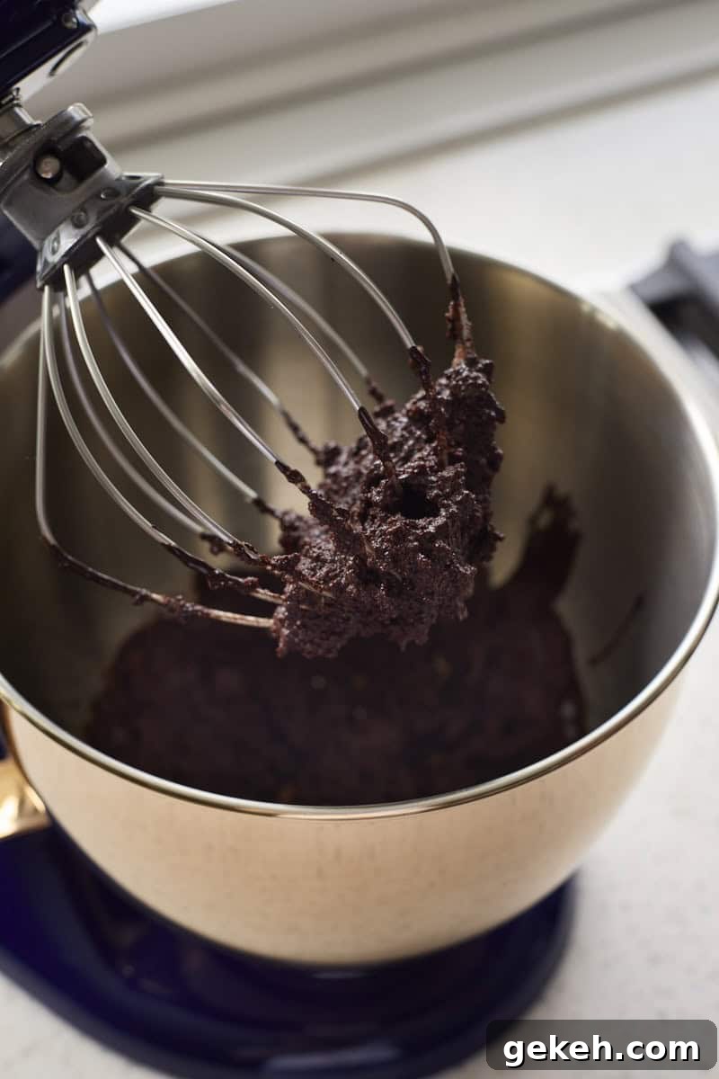 Chocolate and gelatin mixture on a whisk.