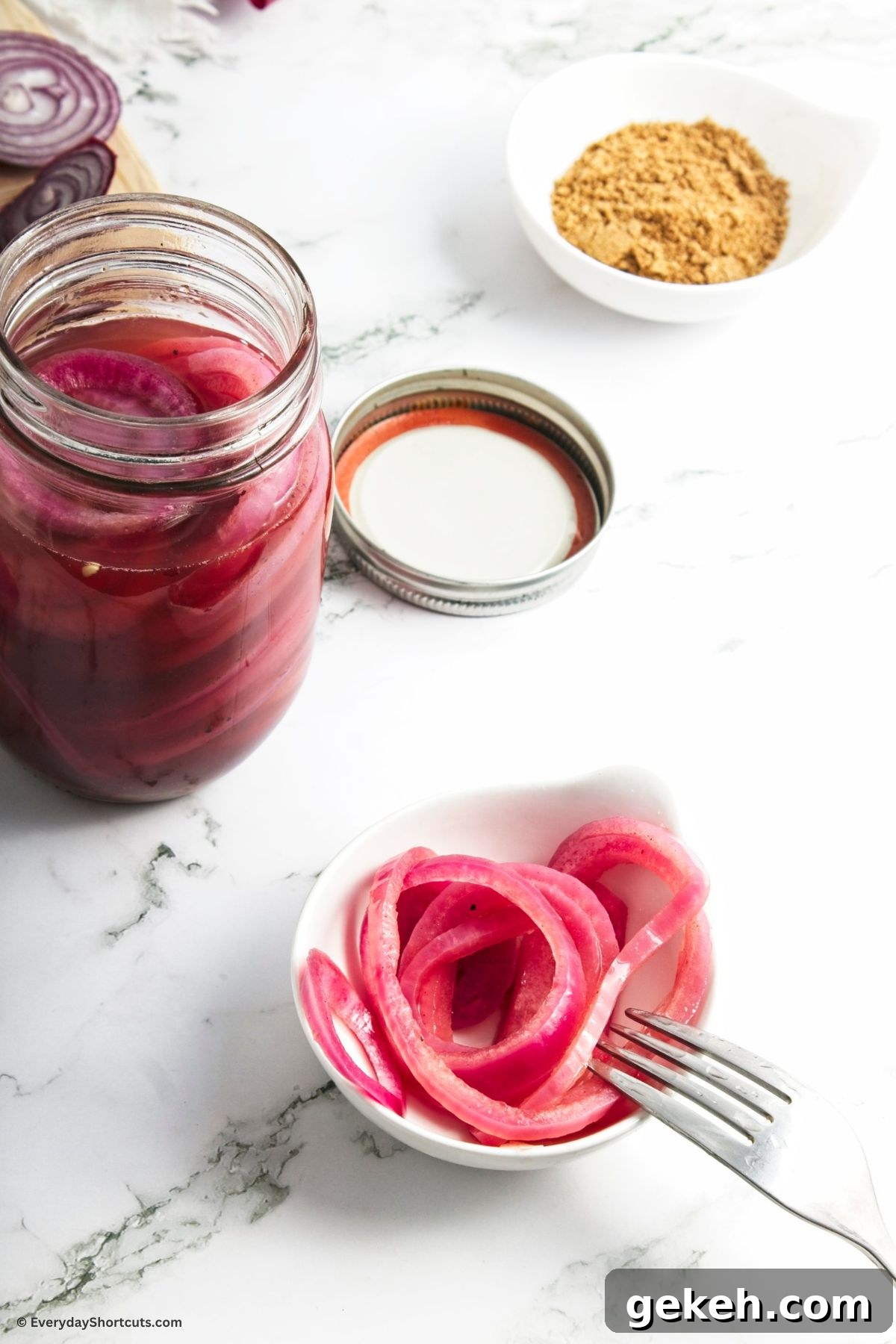 Crisp Quick-Pickled Red Onions for Toppings and Salads 3 pickled red onions in a mason jar