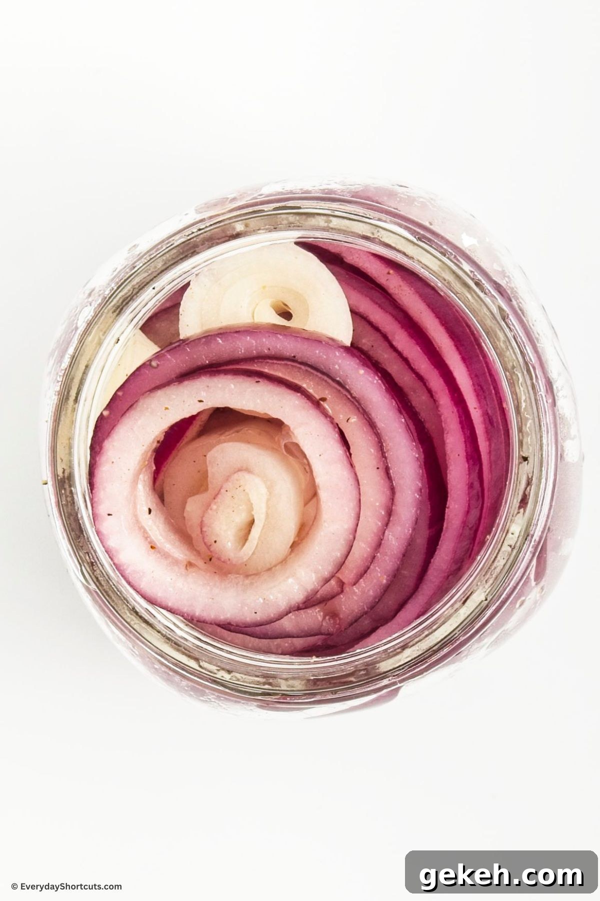 Crisp Quick-Pickled Red Onions for Toppings and Salads 6 thin sliced onions in a mason jar
