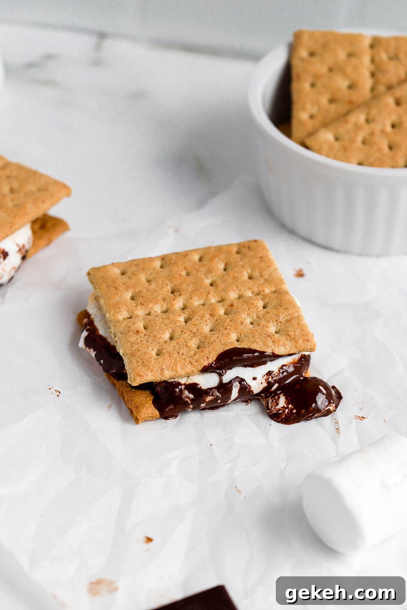 Air Fryer S'mores Recipe: Quick, Crispy S'mores in Minutes 5 air fryer s'mores on parchmemnt paper